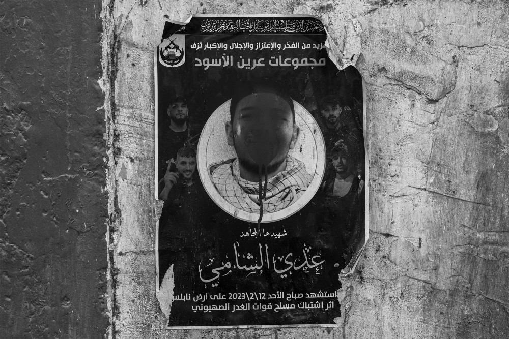 A funeral poster was affixed in the Nablus refugee camp to commemorate the passing of Adai al Shami, a young member of the Lions' Den militant group, on October 29, 2023.