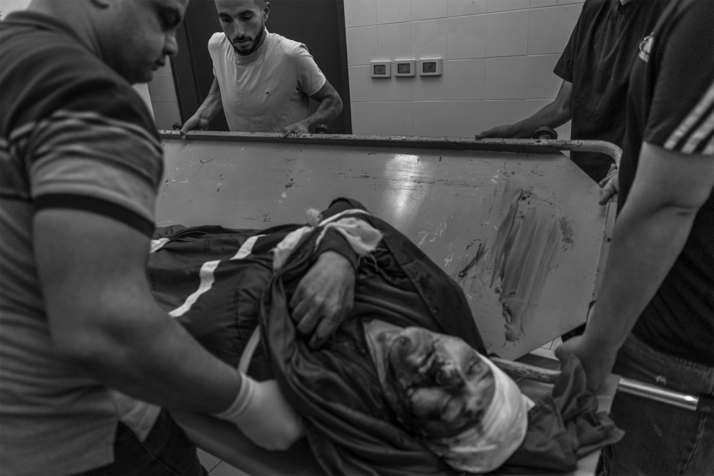 The body of Majdi Awad, 67 years old, is cleaned and arranged in the morgue of Tulkarem before the funeral on November 1, 2023. Majdi Awad was killed during an IDF nighttime raid in Tulkarem. According to interviews obtained on the ground, Majdi, a civilian, lost his life early in the morning as he was heading to the mosque for prayers.