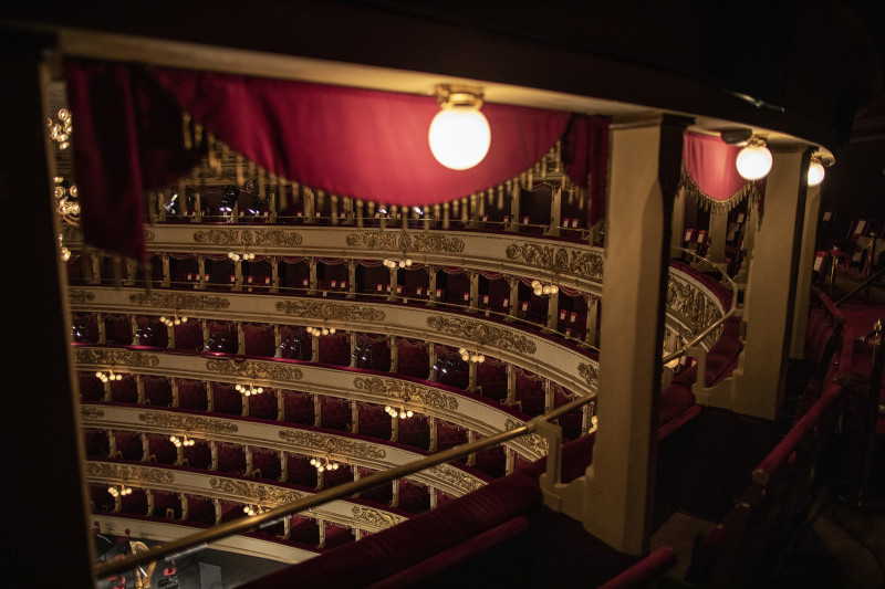 The La Scala Theater in Milan on March 24, 2021. In Italy, theaters like many other cultural activities are closed to avoid further risks of Covid-19 contagion. Due to the restrictions imposed by the government, the theater offers various events in streaming. On March 24, the Director Nicola Luisotti conducted the theater orchestra for a concert in streaming. In March 2020, Italy found itself at the center of the global epidemic of Covid-19. Today, a year later, the country is facing a new peak of growth (the third wave) of infections and victims. The government responded by imposing a new lockdown in the various regions and closing one more time any artistic and cultural activity: one of the most affected sector by the economic crisis today.